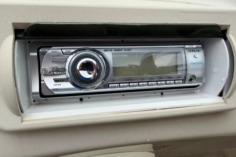 Slide: The Image of Sony marine stereo system in a 2014 Bennington 21 SLX boat dashboard. - 12
