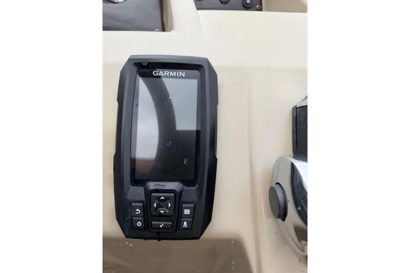 Slide: The Image of Garmin device on 2014 Bennington 21 SLX boat dashboard, close-up view. - 8