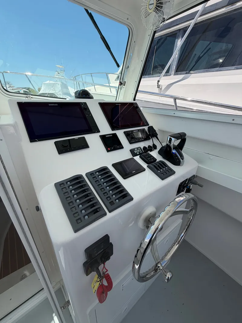 Slide: The Image of Interior of 2023 Steiger Craft 31 Fisherman with cushions and sink. - 15
