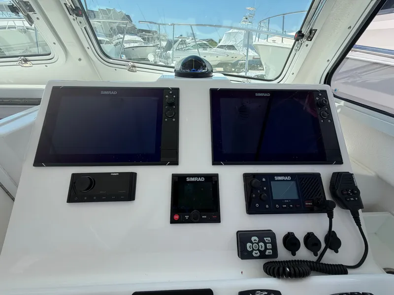 Slide: The Image of Interior of 2023 Steiger Craft 31 Fisherman with toilet and seating area. - 16