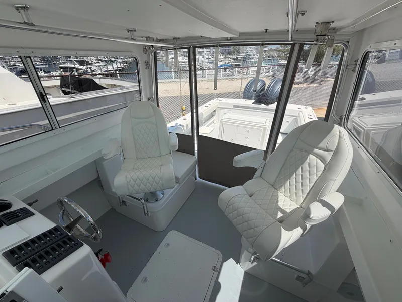 Slide: The Image of Steiger Craft 31 Fisherman 2023, close-up of boat logo. - 18