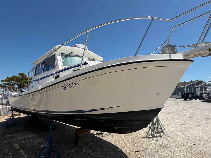 Slide: The Image of 2023 Steiger Craft 31 Fisherman on calm waters. - 2