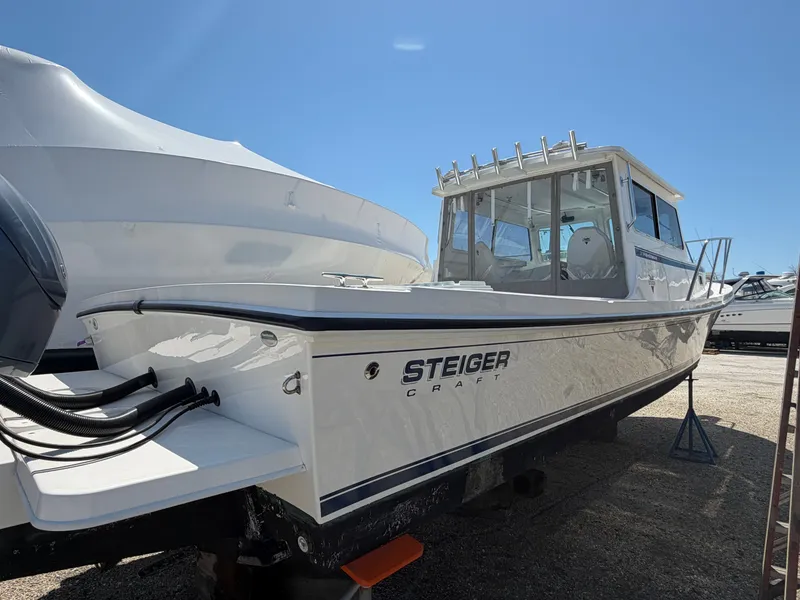 Slide: The Image of Aerial view of 2023 Steiger Craft 31 Fisherman boat on water. - 3