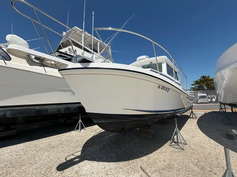 Slide: The Image of Rear view of Steiger Craft 31 Fisherman 2023 on calm waters. - 4