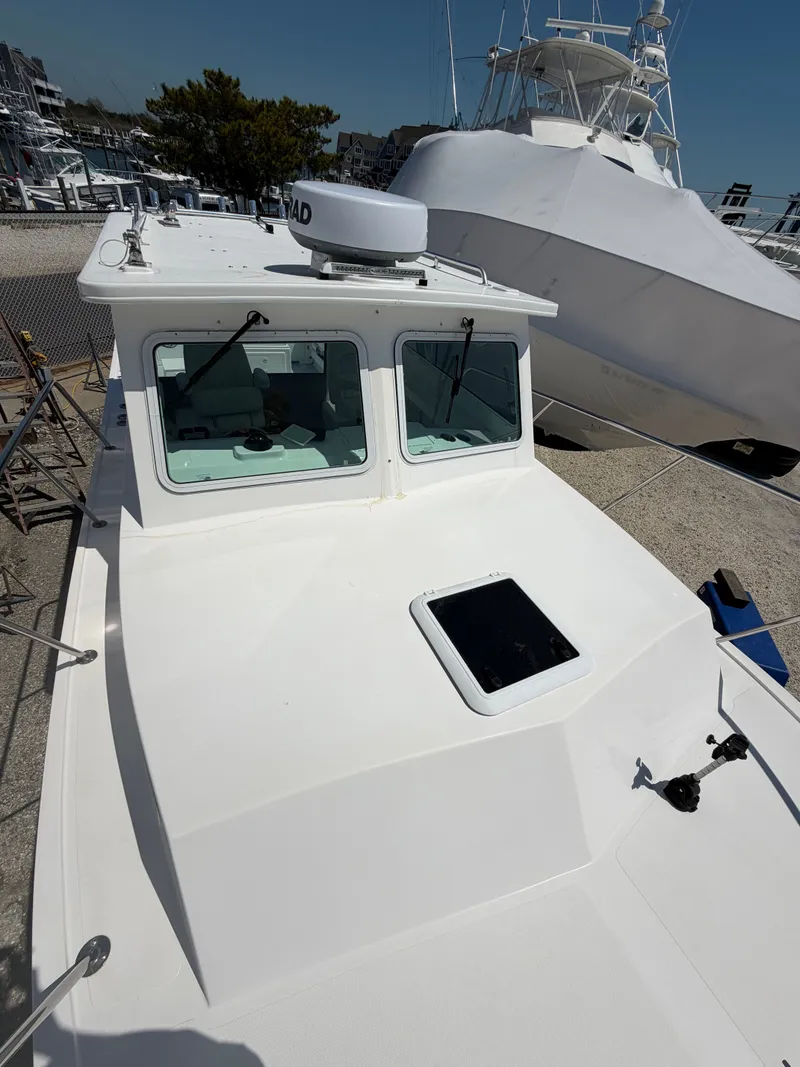 Slide: The Image of 2023 Steiger Craft 31 Fisherman with Yamaha outboard engines. - 5