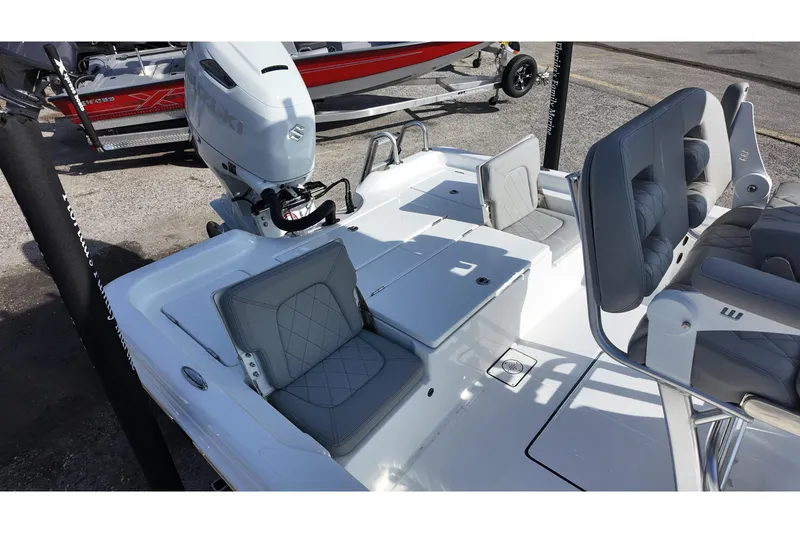 Slide: The Image of 2026 Blazer PureBay 2400 boat interior with gray seating and modern design. - 12