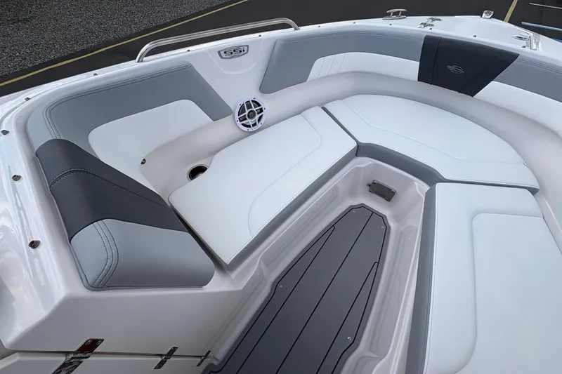Slide: The Image of 2026 Chaparral 23 SSi OB boat interior with sleek, modern seating and speaker system. - 11