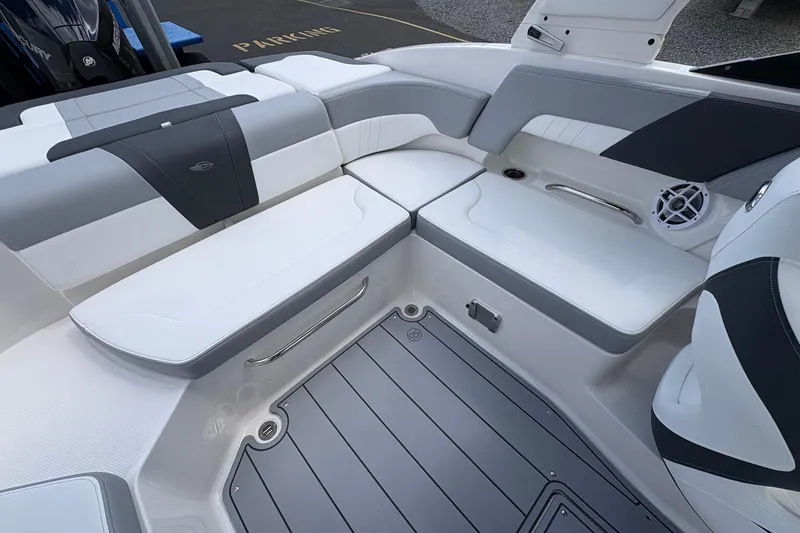 Slide: The Image of Luxurious seating area on 2026 Chaparral 23 SSi OB boat, featuring sleek design and modern upholstery. - 17