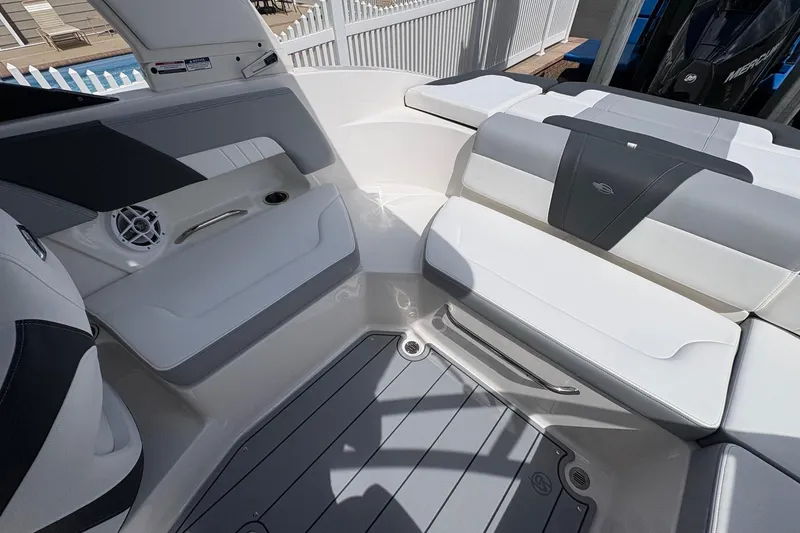 Slide: The Image of 2026 Chaparral 23 SSi OB boat interior with sleek seating and modern design. - 18