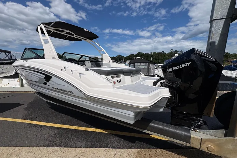 Slide: The Image of 2026 Chaparral 23 SSi OB boat with Mercury outboard engine on a trailer. - 22