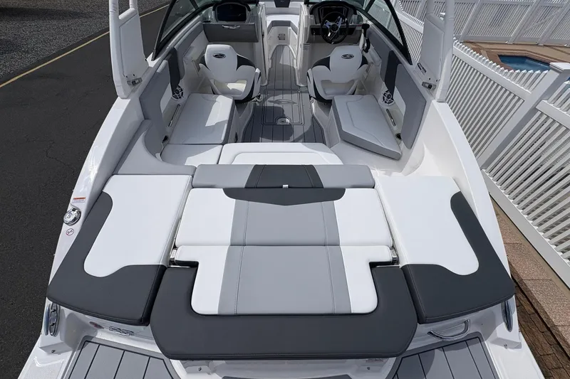 Slide: The Image of 2026 Chaparral 23 SSi OB boat interior with sleek seating and modern design. - 8