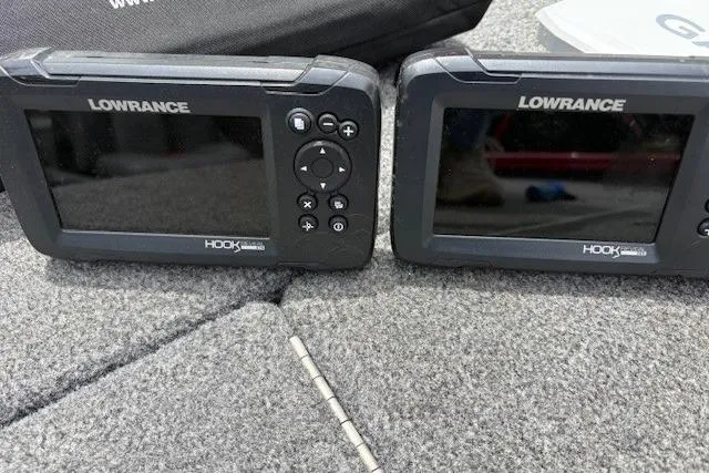 Slide: The Image of Lowrance Hook fish finders on 2023 Tracker Pro Team 195 TXW Tournament Edition boat. - 10