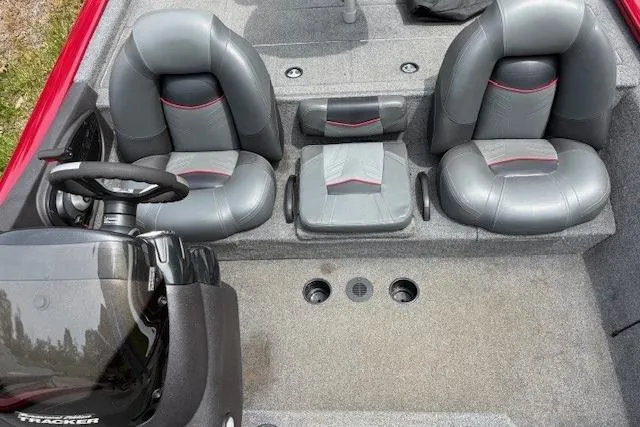 Slide: The Image of 2023 Tracker Pro Team 195 TXW Tournament Edition boat interior with gray seating. - 18