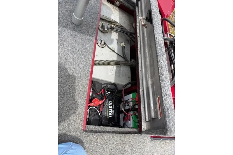 Slide: The Image of 2023 Tracker Pro Team 195 TXW Tournament Edition boat battery compartment. - 22