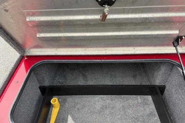 Slide: The Image of Open storage compartment of 2023 Tracker Pro Team 195 TXW Tournament Edition boat. - 6