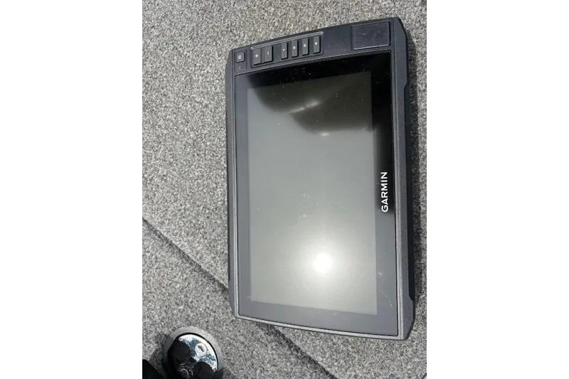 Slide: The Image of Garmin device on 2023 Tracker Pro Team 195 TXW Tournament Edition boat deck. - 9