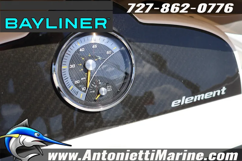 Slide: The Image of Dashboard of 2026 Bayliner Element E16 boat with speedometer and branding. - 11