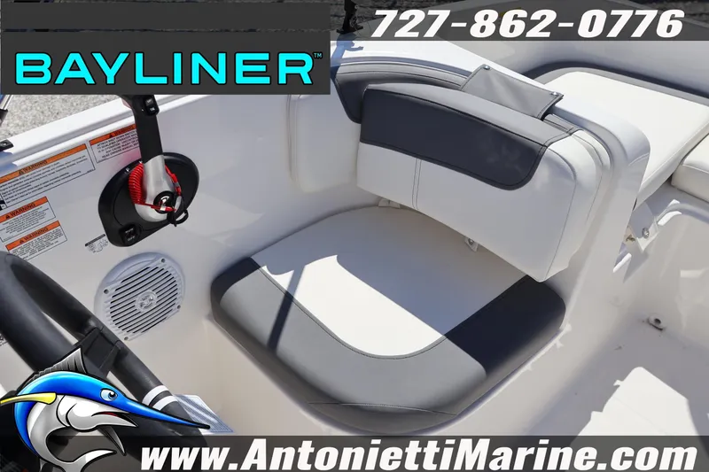 Slide: The Image of 2026 Bayliner Element E16 boat interior with seating and control panel. - 18