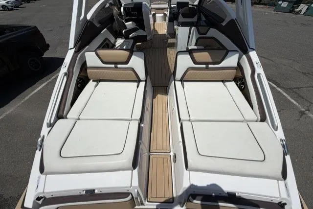 Slide: The Image of 2021 Yamaha Boats 275SD interior with spacious seating and sleek design. - 14