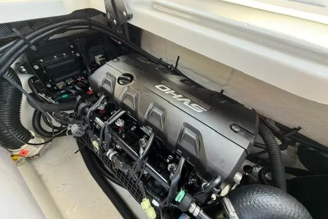 Slide: The Image of 2021 Yamaha Boats 275SD engine compartment showcasing detailed mechanical components. - 34