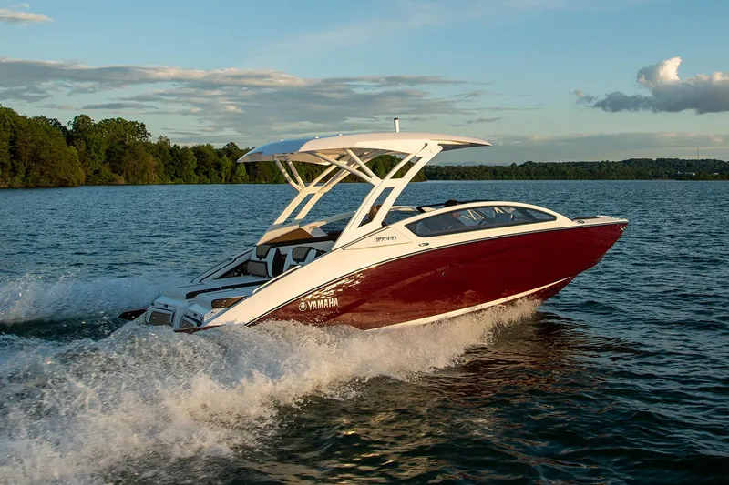 Slide: The Image of Manufacturer Provided Image: 2021 Yamaha Boats 275SD cruising on a lake at sunset. - 4