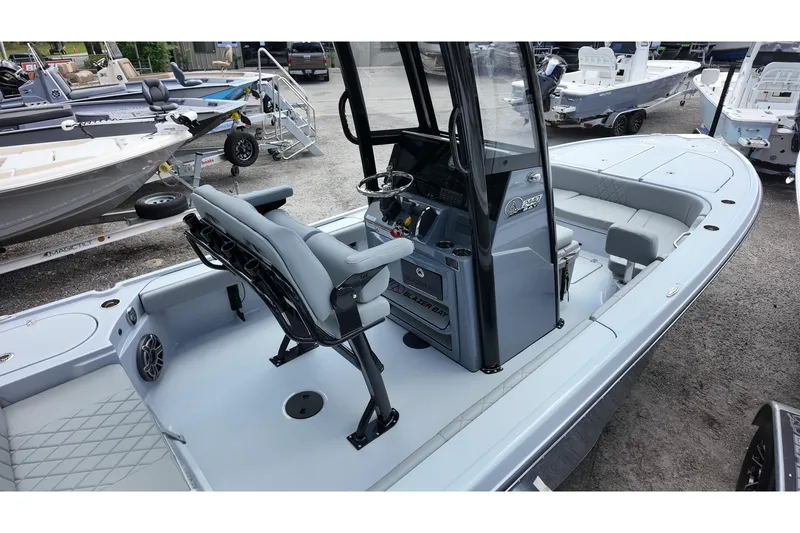 Slide: The Image of 2026 Blazer Bay 2440 boat with sleek design and modern console features. - 5