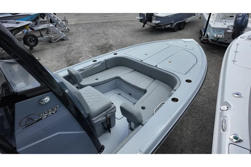 Slide: The Image of 2026 Blazer Bay 2440 boat with spacious seating and sleek design. - 7