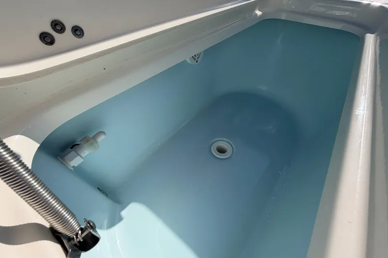 Slide: The Image of 2024 Key West 210 Bay Reef boat interior compartment detail. - 103
