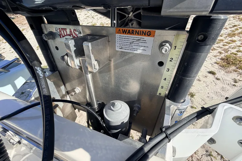 Slide: The Image of Close-up of 2024 Key West 210 Bay Reef boat's hydraulic steering system. - 109
