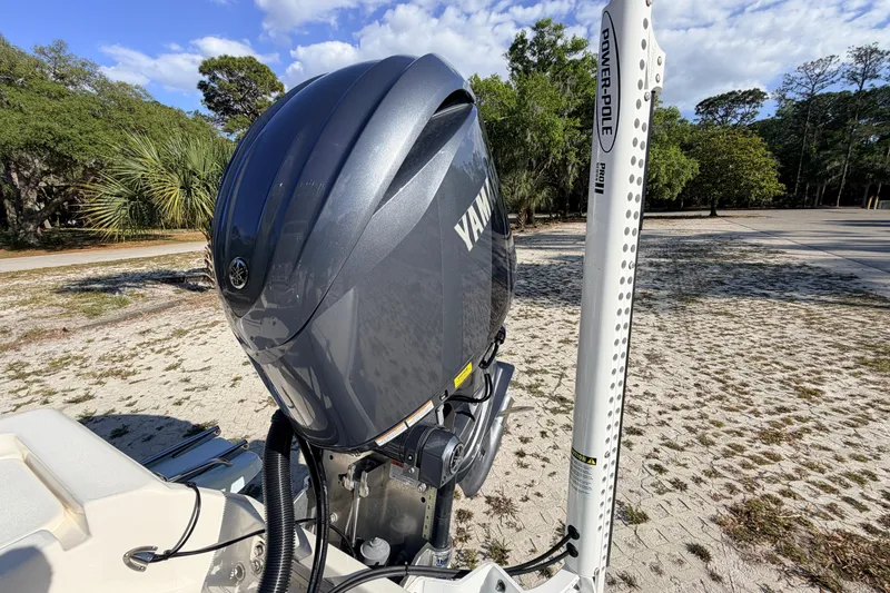 Slide: The Image of 2024 Key West 210 Bay Reef boat with Yamaha outboard motor and Power-Pole anchor system. - 111