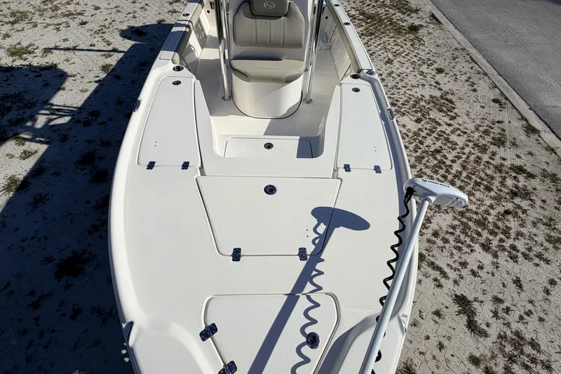 Slide: The Image of 2024 Key West 210 Bay Reef boat deck with seating and trolling motor. - 27