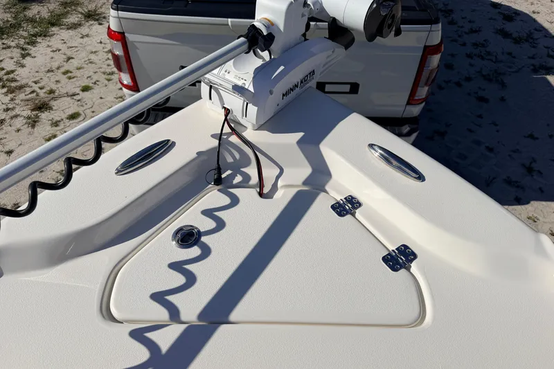 Slide: The Image of 2024 Key West 210 Bay Reef boat with Minn Kota trolling motor on sandy beach. - 30