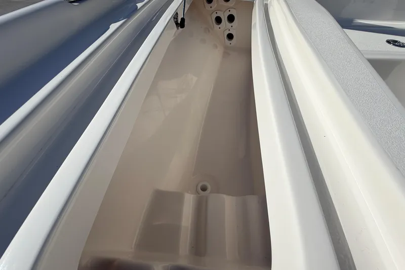 Slide: The Image of 2024 Key West 210 Bay Reef boat storage compartment, showcasing spacious interior design. - 38