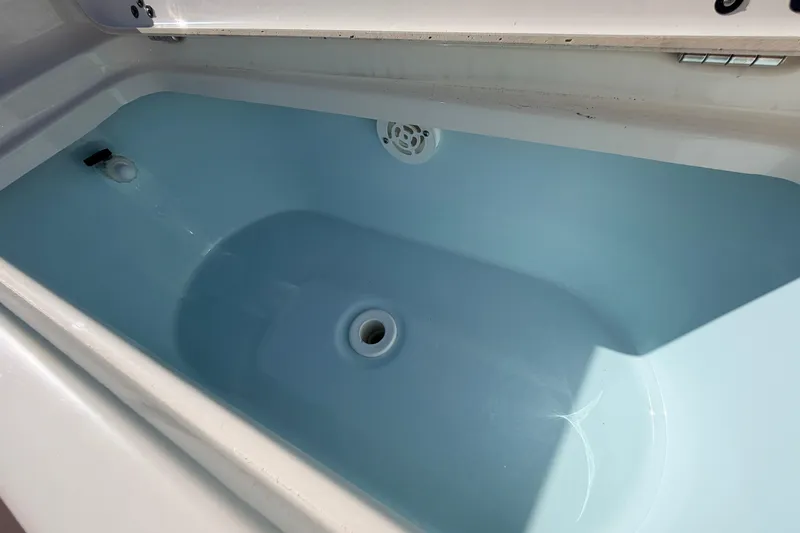 Slide: The Image of Livewell compartment in 2024 Key West 210 Bay Reef boat. - 42