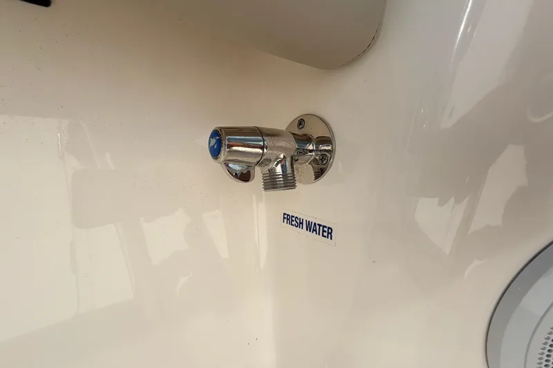 Slide: The Image of Fresh water outlet on 2024 Key West 210 Bay Reef boat. - 55
