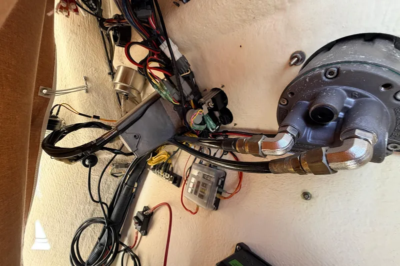 Slide: The Image of 2024 Key West 210 Bay Reef boat wiring and hydraulic system close-up. - 64