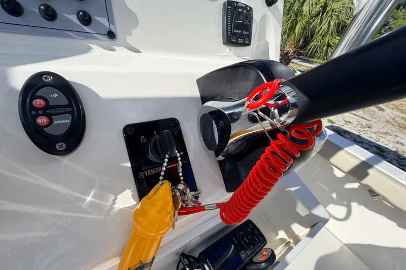 Slide: The Image of 2024 Key West 210 Bay Reef boat controls with Yamaha ignition and throttle. - 71
