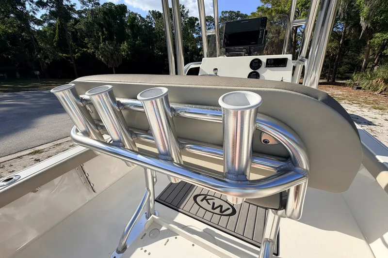 Slide: The Image of 2024 Key West 210 Bay Reef boat with rod holders and console. - 89