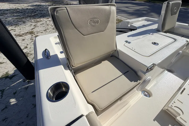 Slide: The Image of 2024 Key West 210 Bay Reef boat seat with cup holder and storage compartment. - 96