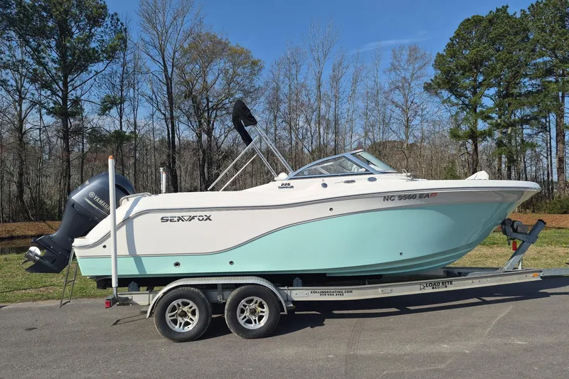 The Image of 2015 Sea Fox 226 Traveler boat on trailer, parked outdoors. - 0