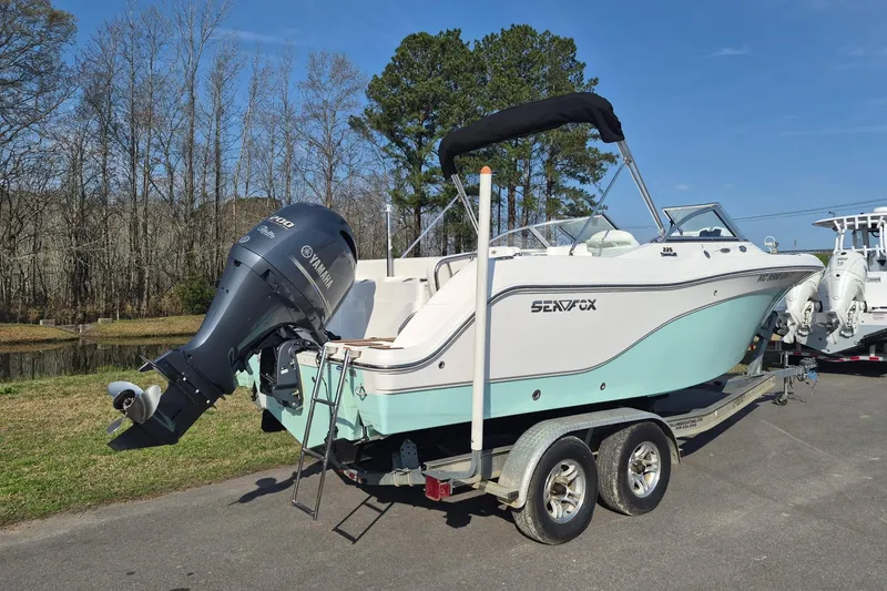 Slide: The Image of 2015 Sea Fox 226 Traveler boat on trailer with Yamaha outboard motor. - 2
