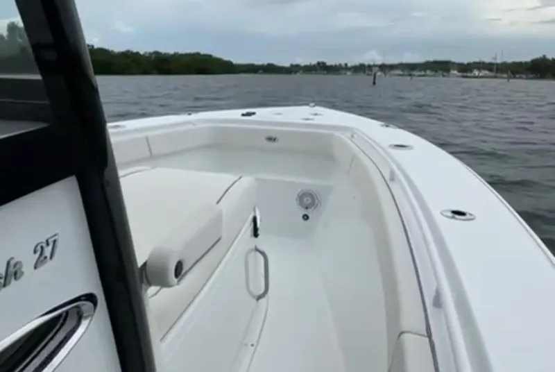 Slide: The Image of 2023 Sea Hunt Gamefish 27 with Coffin Box on calm waters. - 13