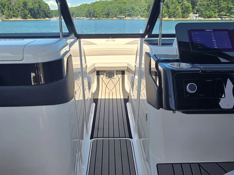Slide: The Image of The image shows the cockpit of a 2026 Sea Ray SLX 260 Surf with a modern design. - 20