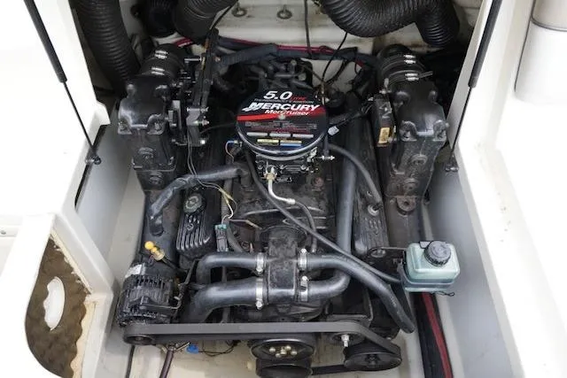 Slide: The Image of Engine compartment of a 2002 Sea Ray 190 Sundeck with a 5.0 Mercury engine. - 17