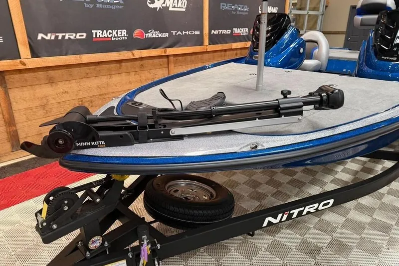 Slide: The Image of 2026 Nitro Z17 boat with Minn Kota trolling motor on display. - 5