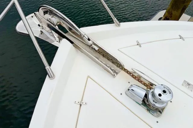 Slide: The Image of Bow of a 1995 Symbol Pilothouse boat with anchor and winch system. - 10