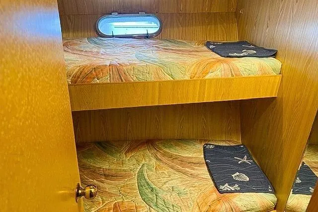 Slide: The Image of Interior of a 1995 Symbol Pilothouse with bunk beds. - 40