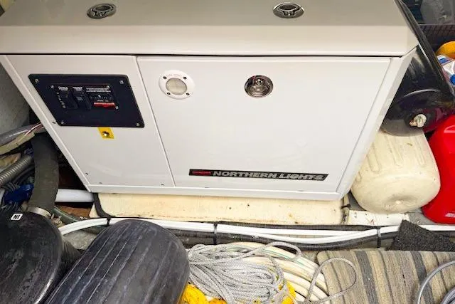 Slide: The Image of Northern Lights generator in a 1995 Symbol Pilothouse boat engine room. - 48