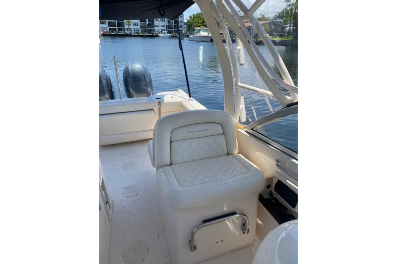 Slide: The Image of 2021 Grady-White Freedom 255 boat interior with compact marine toilet. - 12