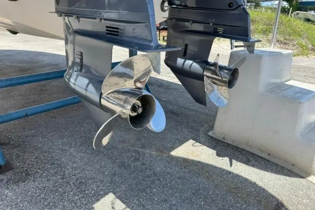 Slide: The Image of 2021 Grady-White Freedom 255 boat propellers on display, showcasing sleek design and craftsmanship. - 28